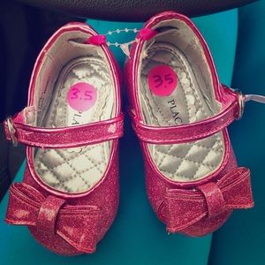 Pink glitter baby shoes